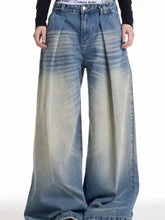 Men’s full size wide leg wash jeans in denim with faded blue-to-white ombre and pleated front design