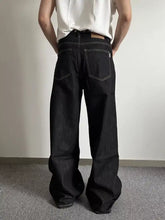 Men’s full size wide leg denim jeans in black with contrasting white stitching and a premium cotton blend textured finish