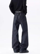 Men’s dark indigo denim wide leg wash jeans with visible stitching designed for full size wide leg fit