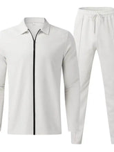 Men’s full size zip up top and pants set plus size in white with black zipper and subtle textured fabric