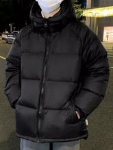 Black men’s full size zip up warm padded hooded puffer jacket with quilted design and zipper closure