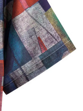 Mens geometric short sleeve button down shirt in plaid flannel with red, blue, orange colors