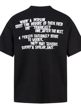 Black short-sleeve t-shirt with white text, from mens half zip collection