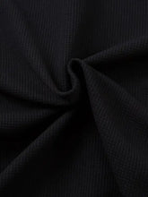 Mens henley structured black waffle knit short sleeve shirt fabric