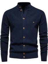 Mens long sleeve cardigan in navy blue with gold buttons and moderate stretch