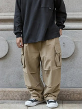 Mens loose fit cargo pants with multiple pockets and reinforced knees