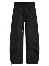 Mens loose fit drawstring cargo pants in black with elastic cuffs