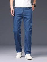 Men’s loose fit blue denim jeans with straight-leg cut classic stitching and functional pockets