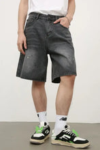 Mens mid rise denim shorts in faded black with white paint splatters