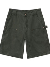 Mens mid rise denim shorts in dark green with utility pockets