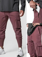 Men’s maroon cargo jogger pants with zippered pockets and drawstring waist