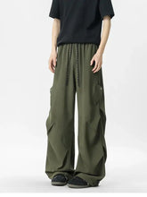 Mens oversized wide leg cargo pants in olive green with drawstring waist