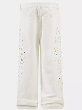 Off-white denim men’s paint splatter artistic wide leg jeans with colorful paint splatter accents along outer legs