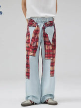 Men’s light-wash wide leg jeans paired with a bold red and beige plaid wide leg shirt tied at the waist