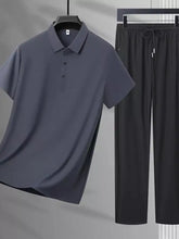 Men’s plus size button detail polo and pants set featuring a dark gray short-sleeved polo with classic collar