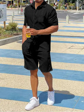 Men’s plus size black short-sleeved button-up shirt with collar and front pocket for casual wear