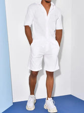 Men’s plus size white short-sleeved button-up shirt and matching shorts set in a minimalist monochrome design