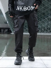 Mens plus size cargo jogger pants in black with multi pockets