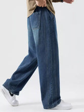 Dark blue denim men’s plus size casual drawstring wide-leg jeans with relaxed fit and visible stitching along seams