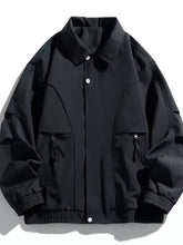 Men’s plus size casual lightweight black utility jacket with structured collar, button closure, and zippered pockets