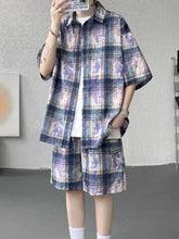 Men’s plus size short-sleeved casual plaid shirt in faded purple blue and beige worn over white shorts