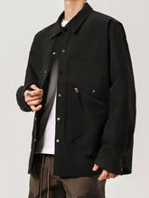 Men’s plus size casual black button-up jacket with silver buttons and zippered pockets for size casual wear