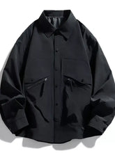Men’s plus size casual snap-down jacket in black with utility-style button-up front and two zippered pockets