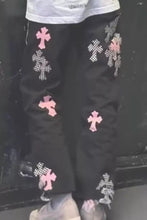 Men’s plus size cross loose fit jeans in black cargo style with pink and black-and-white checkered cross patches
