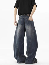 Men’s plus size distressed wide leg jeans in dark-wash denim with a relaxed fit and visible stitching details
