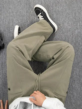 Mens plus size khaki green wide-leg cargo pants with drawstring waist