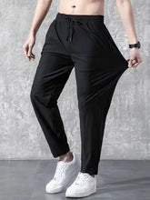 Mens plus size drawstring pants with pockets, black sweatpants and white sneakers
