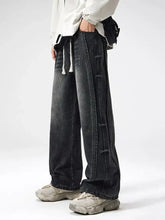 Men plus size dark-wash denim jeans with wide-leg drape and visible stitching details featuring a drawstring waist
