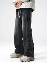 Men plus size dark-wash denim jeans with a relaxed wide-leg drape and contrasting white drawstrings at the waistband