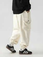 Mens plus size elastic waist joggers in cream cargo style with ribbed cuffs