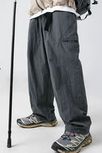 Mens plus size elastic waist pants in loose gray cargo style