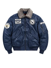 Men’s plus size embroidered patches bomber jacket in navy blue with plush gray shearling collar and multiple patches
