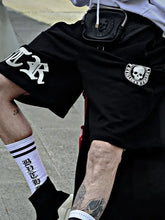 Mens plus size grey hoodie set with black elastic waist shorts, skull patch