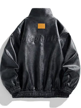Men’s plus size black faux leather bomber jacket with embossed lettering and orange patch on back suitable for machine wash and tumble dry