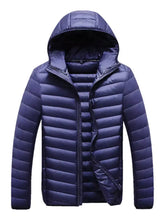 Dark blue quilted men’s plus size lightweight hooded puffer jacket with zipper closure and ribbed cuffs