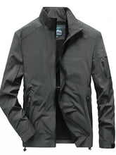 Men’s plus size lightweight dark gray outdoor jacket with multiple zippered pockets machine wash and tumble dry sleeve length adjustable