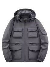 Men’s plus size multi pocket dark gray water-resistant utility jacket with mesh-lined hood for outdoor use