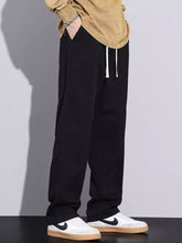 Men’s plus size relaxed fit black drawstring jeans with subtle side seam detailing in a comfortable fabric