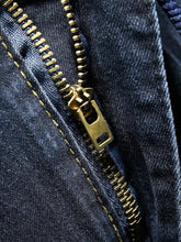 Gold-toned zipper with sturdy metal pull tab on dark blue denim men’s plus size relaxed fit jeans