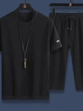 Men’s plus size black cotton round neck short sleeve top featuring hba logo on the left sleeve