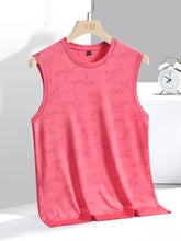 Men’s plus size pink sleeveless round neck tank with subtle lighter pink shark pattern hanging on wooden hanger