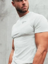 Mens plus size short sleeve athletic t-shirt light grey on muscular man
