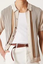 Mens plus size short sleeve striped collared knit shirt over white t-shirt