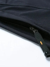 Partial view of mens plus size slim fit pants with exposed zipper and orange accent tab