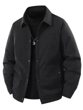 Men’s plus size black utility-style jacket with structured collar and front button closure at the outer edge
