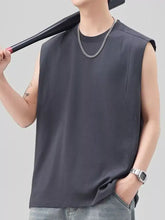 Men’s plus size solid dark gray sleeveless cotton tank top with relaxed fit and subtle side pockets for casual wear